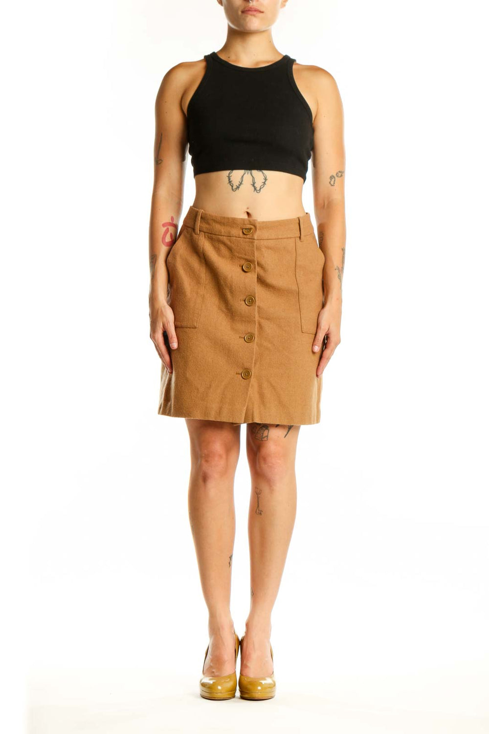 Tan button-front A-line skirt with side pockets and functional buttons, front view
