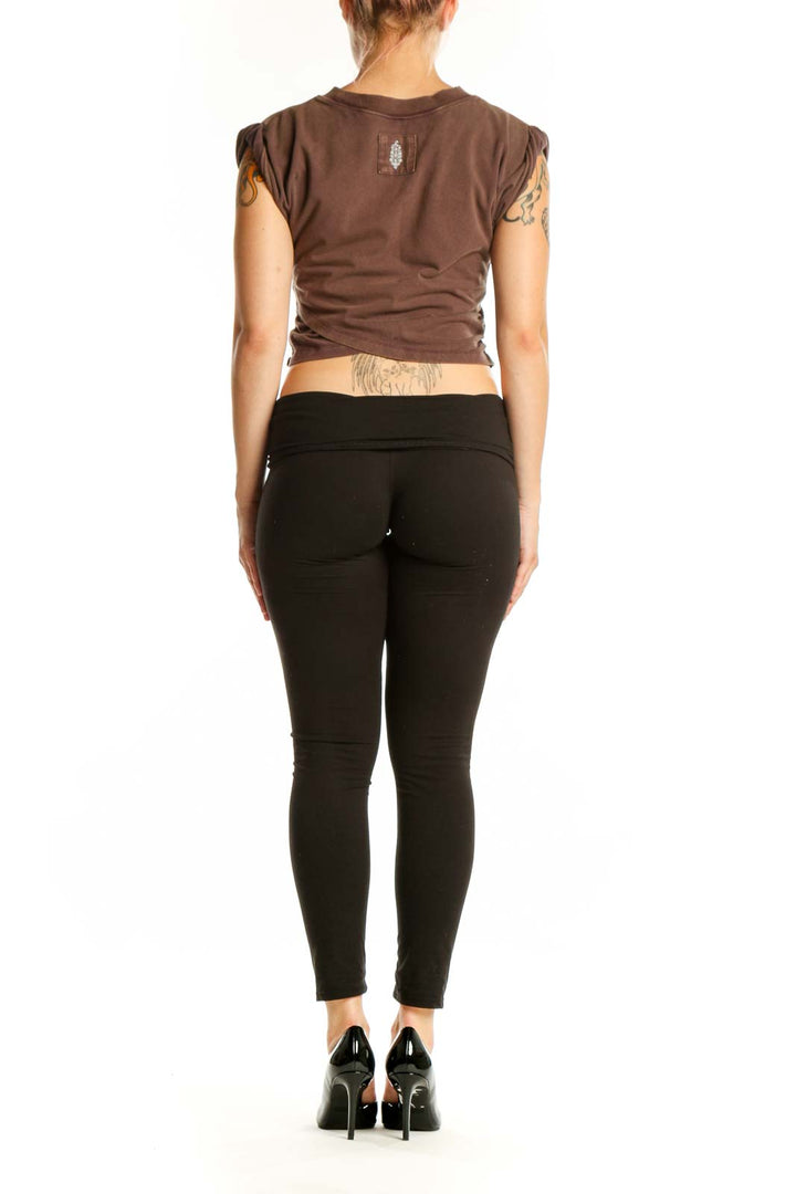 Back view of brown twisted crop tank top showing draped design detail