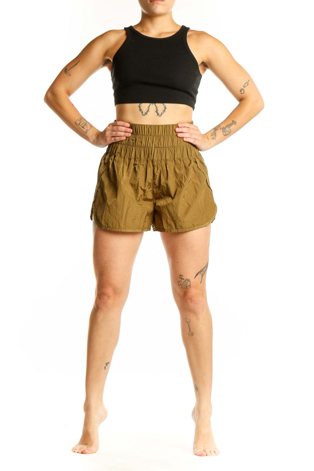 Olive nylon activewear shorts with high-waisted elastic waistband and bubble hem design, front view