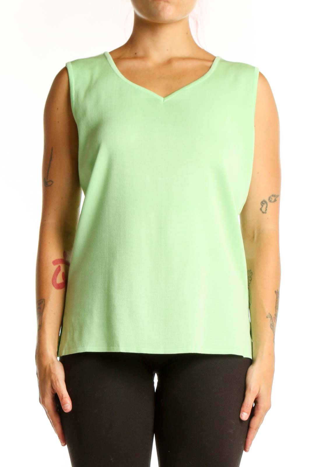 Green v-neck sleeveless knit tank top by MING WANG, front view on model
