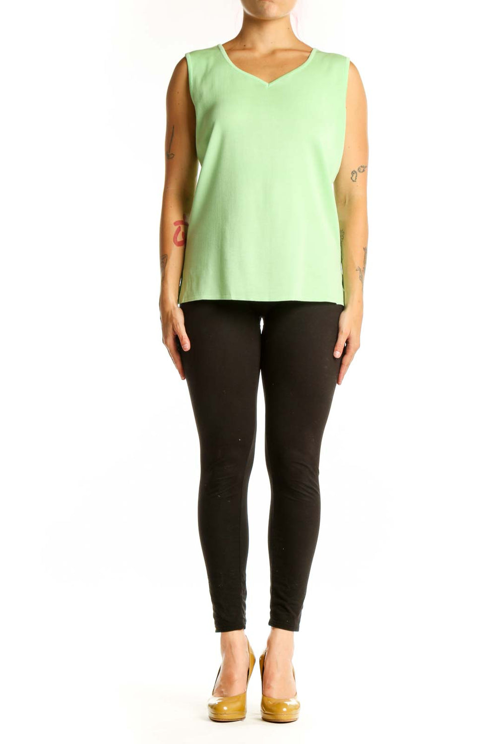 Green v-neck sleeveless knit tank top by MING WANG, front view on model