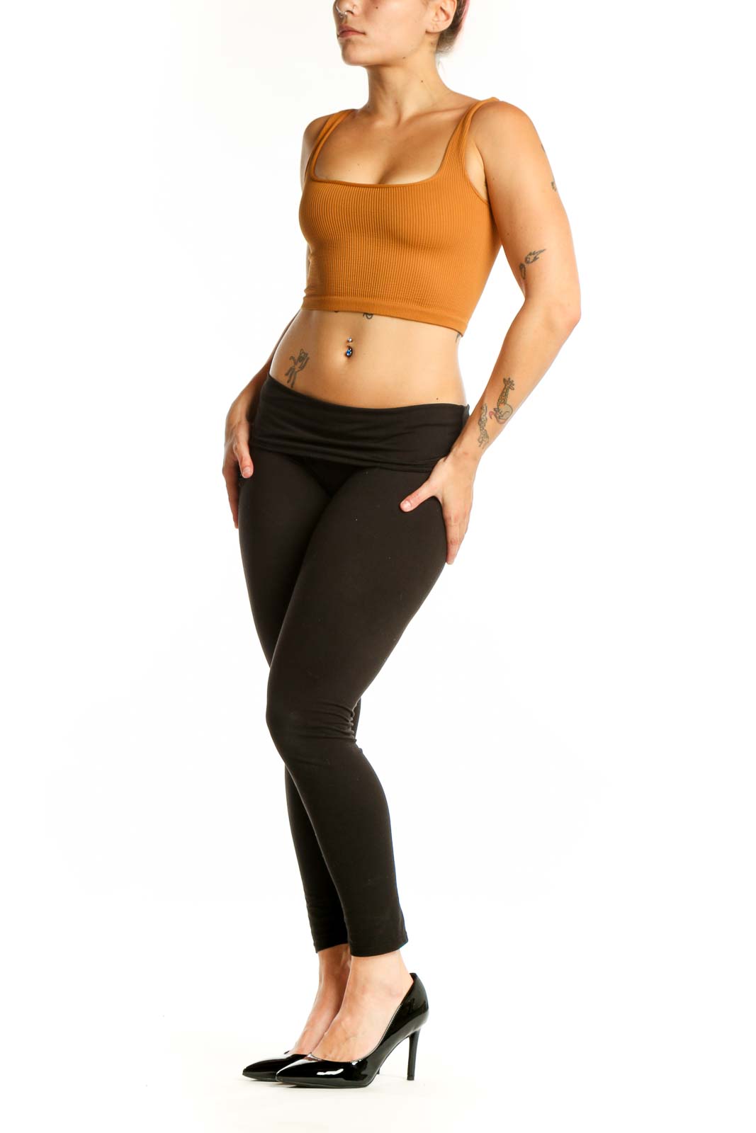 Orange ribbed crop tank top with square neckline, front view on model
