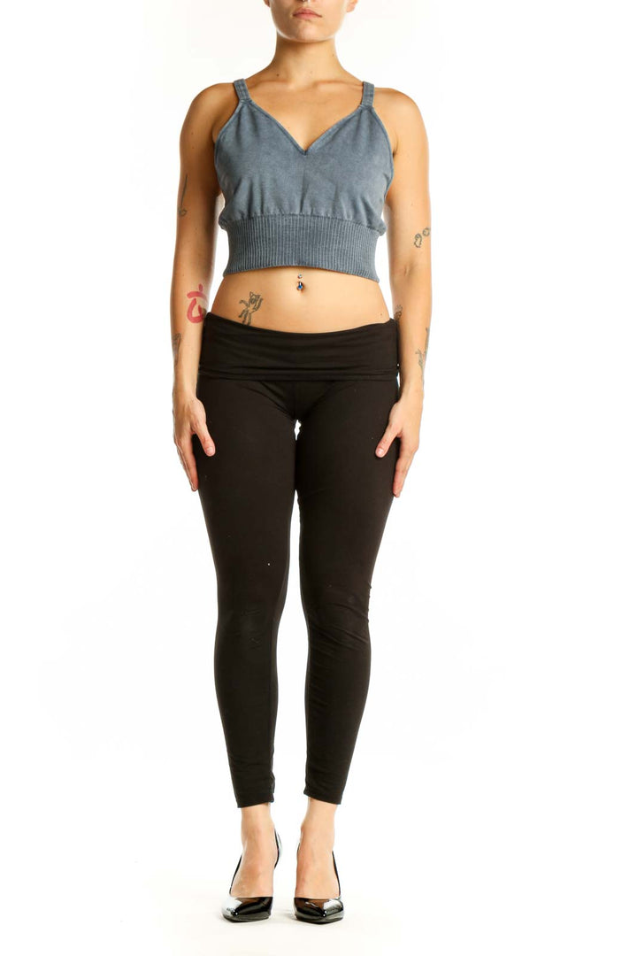Blue ribbed crop tank top with V-neckline and spaghetti straps, front view
