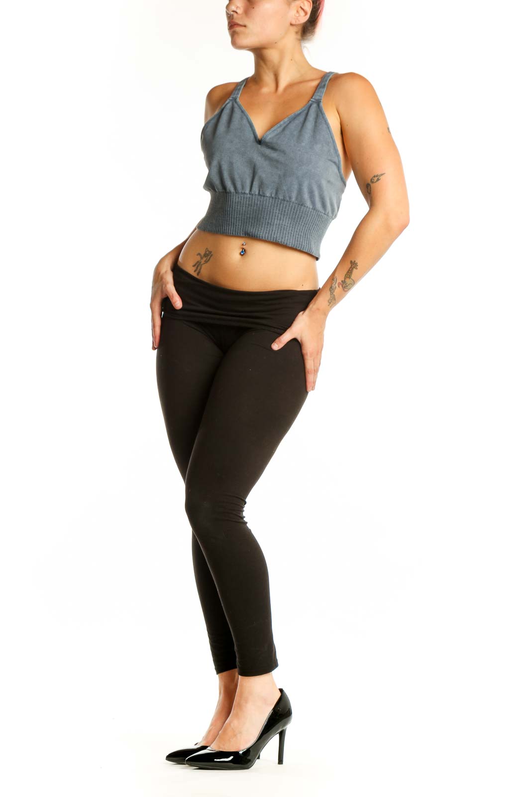 Blue ribbed crop tank top with V-neckline and spaghetti straps, front view