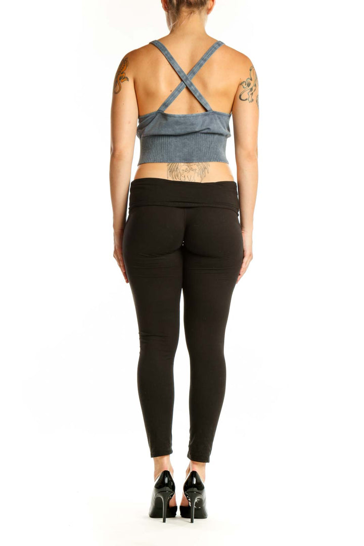 Blue ribbed crop tank top with V-neckline and spaghetti straps, back view
