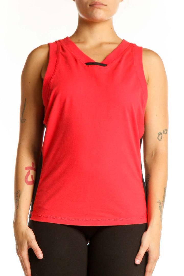 Red athletic tank top with V-neckline and black cutout detail, front view