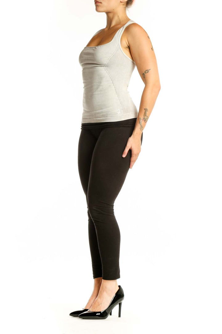 White racerback athletic tank top with square neckline, front view on model