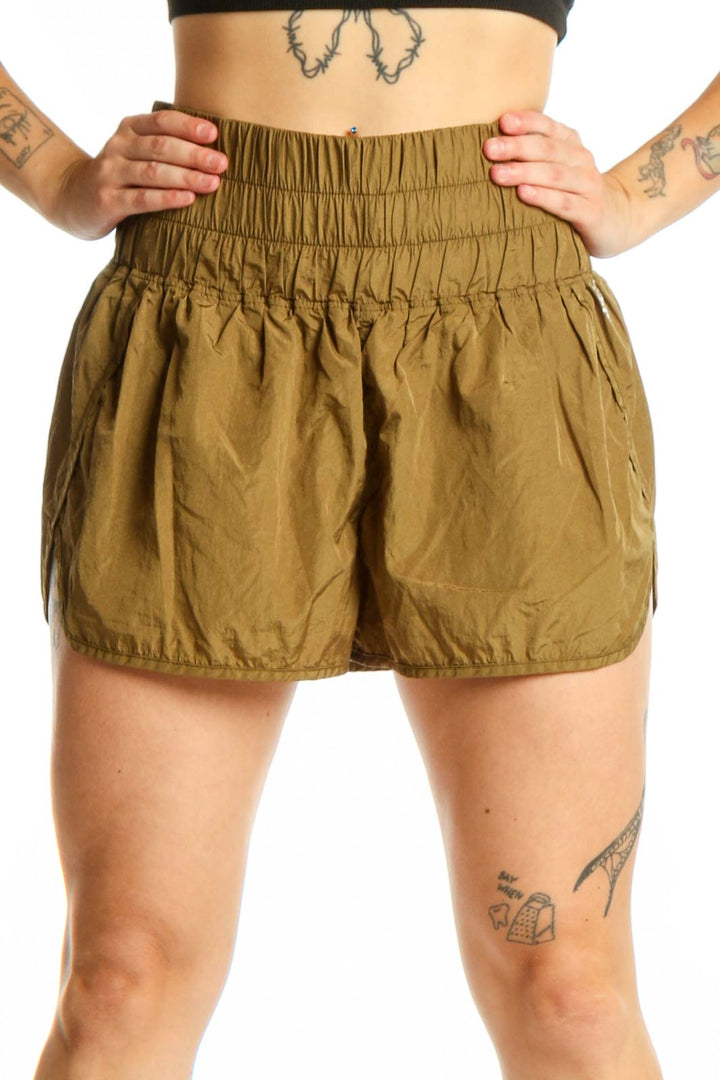 Olive bubble shorts with high-waisted elasticated waistband, front view on model