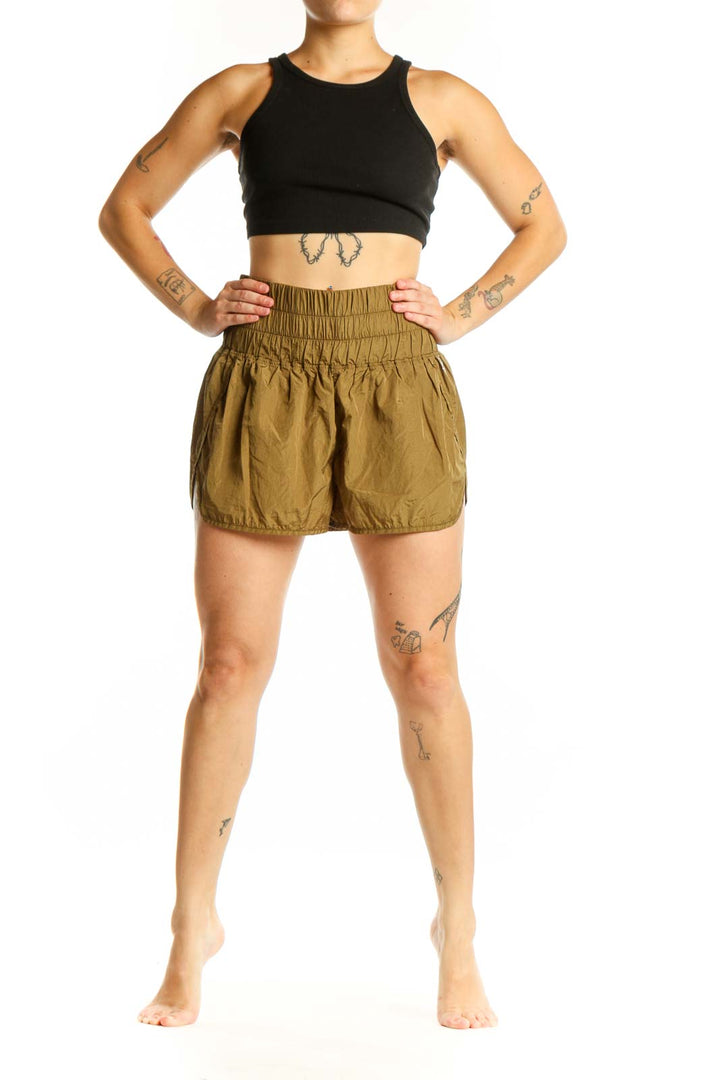 Olive bubble shorts with high-waisted elasticated waistband, front view on model
