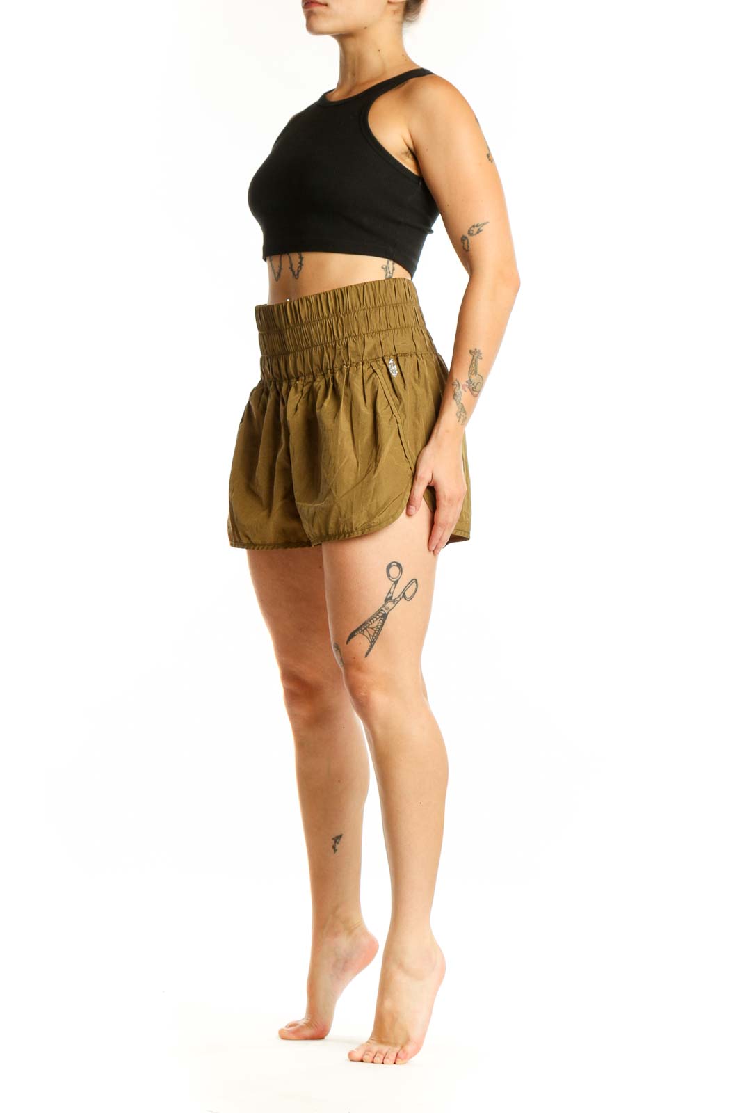 Olive bubble shorts with high-waisted elasticated waistband, front view on model