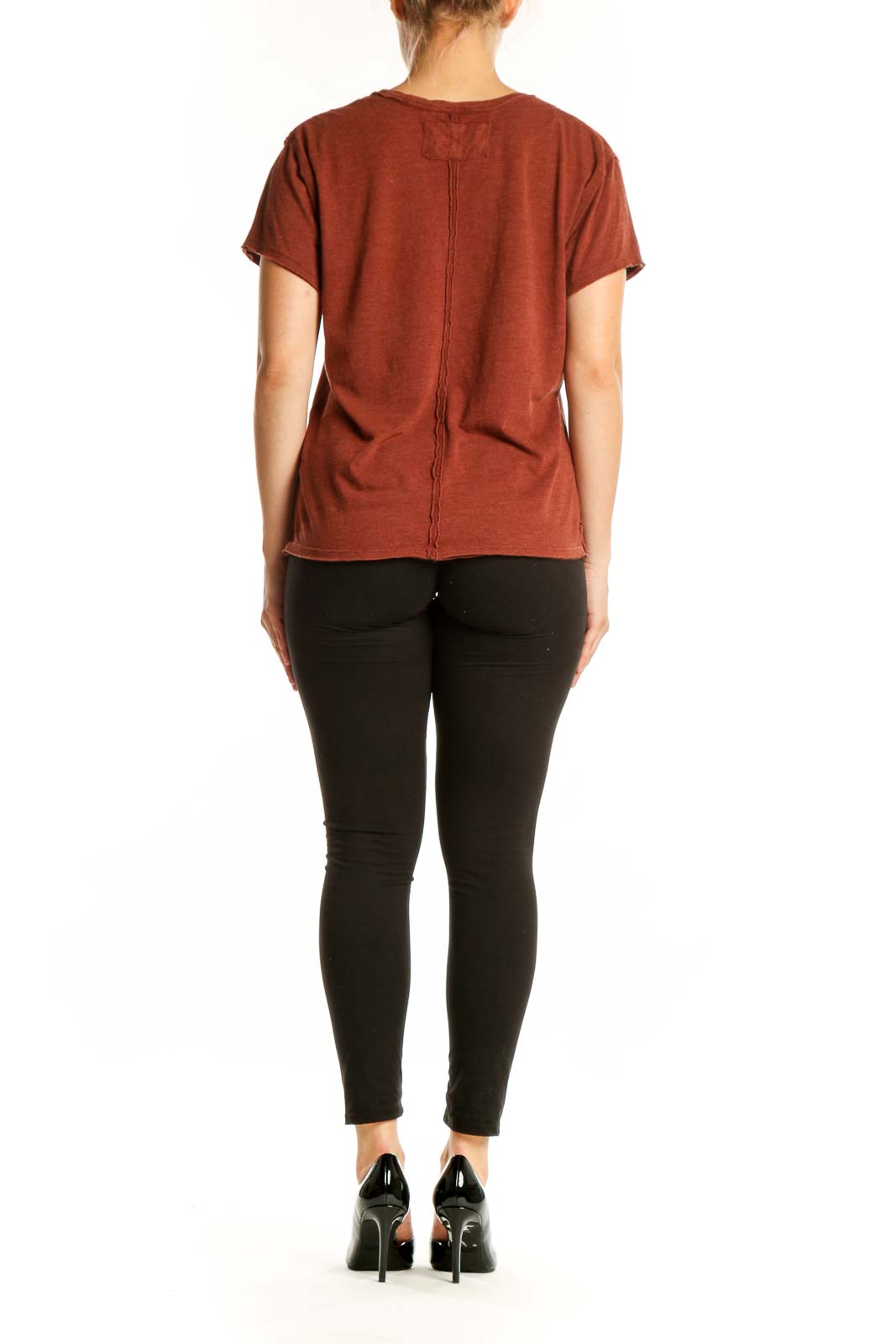 Rust organic cotton short sleeve tee by WE THE FREE, back view showing relaxed fit and distressed sleeve edges
