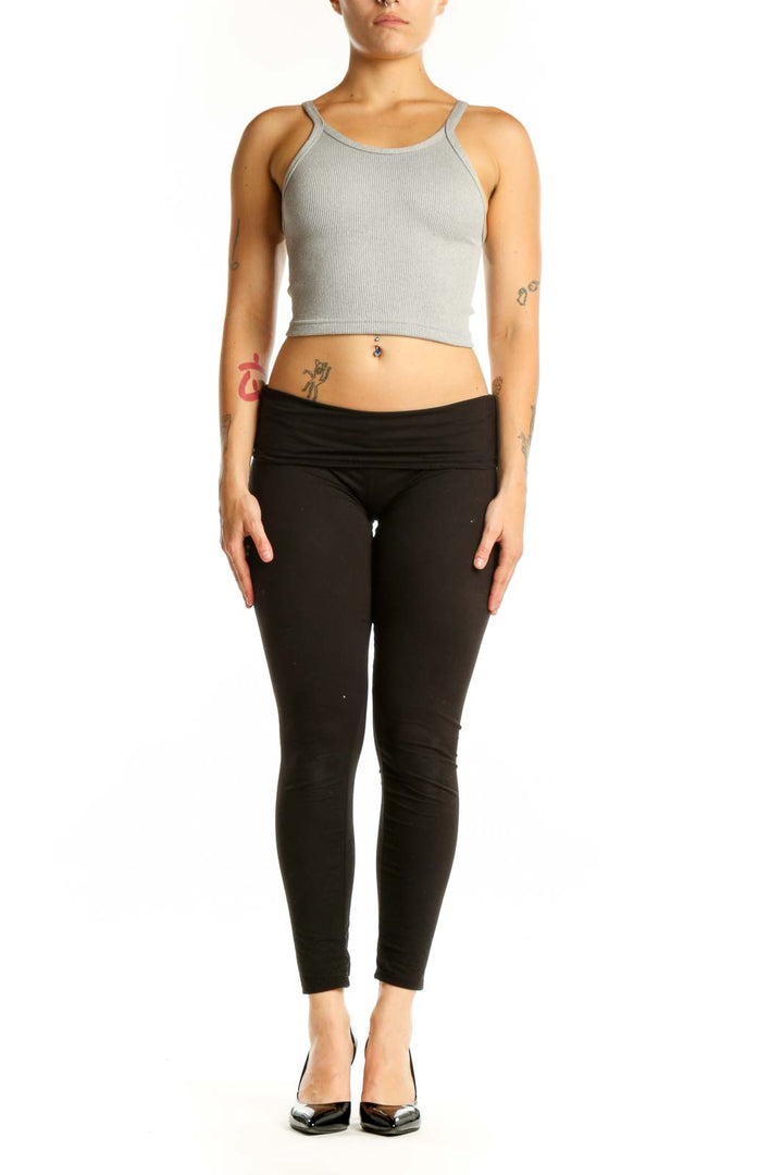 Gray ribbed crop tank top with spaghetti straps, front view on model