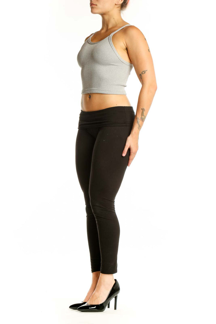 Gray ribbed crop tank top with spaghetti straps, front view on model