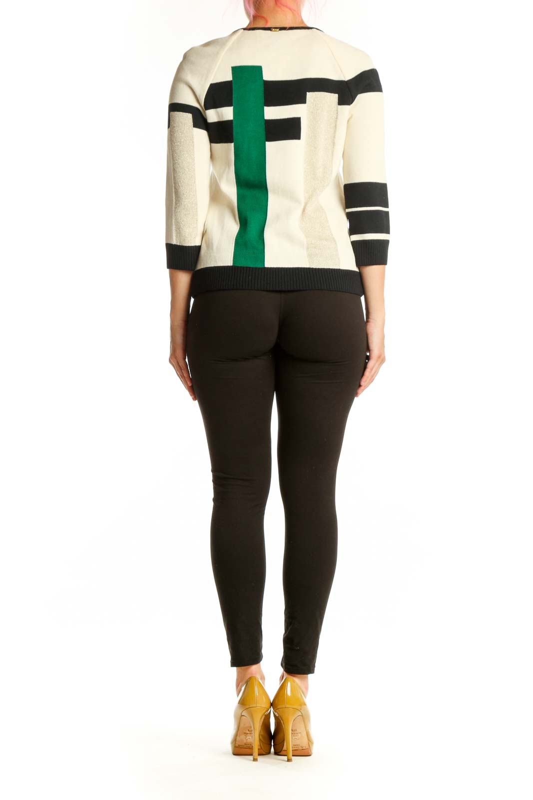 Back view of geometric knit cardigan showing color-block pattern in green, cream, and black with three-quarter sleeves