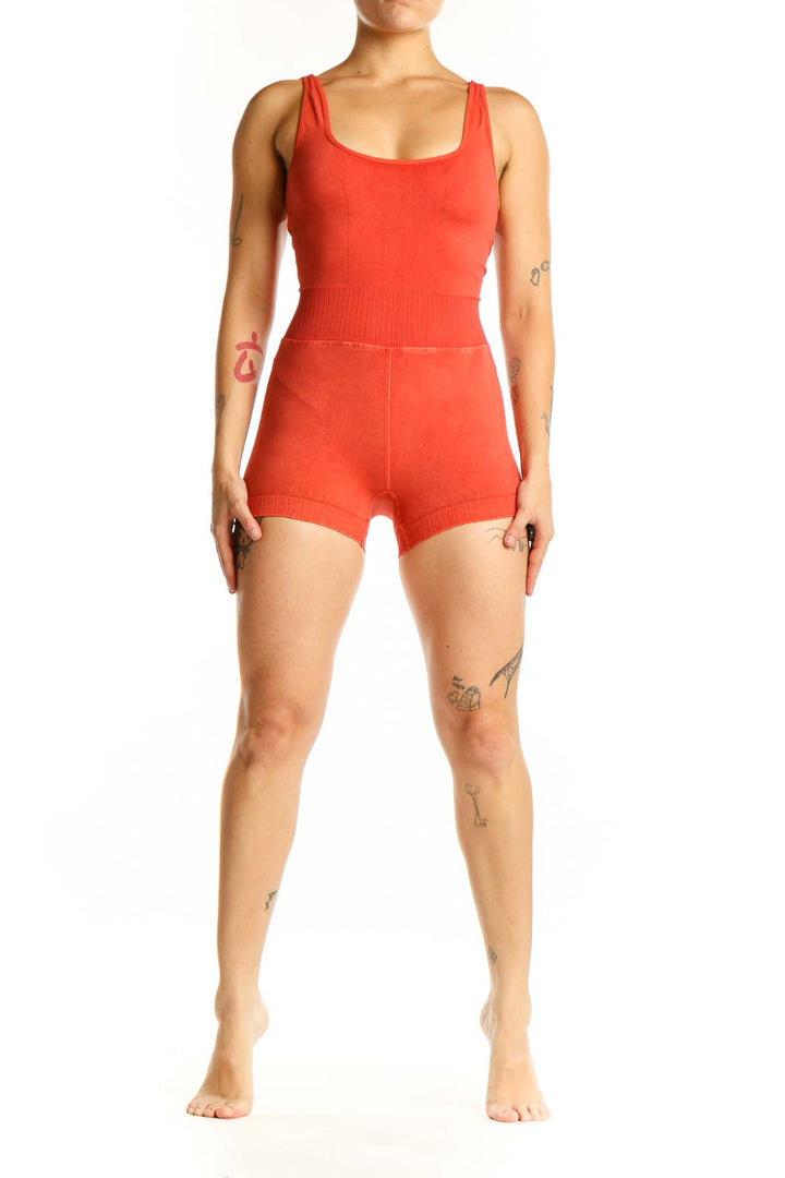 Red ribbed knit shorts romper with scoop neckline and fitted waistband, front view