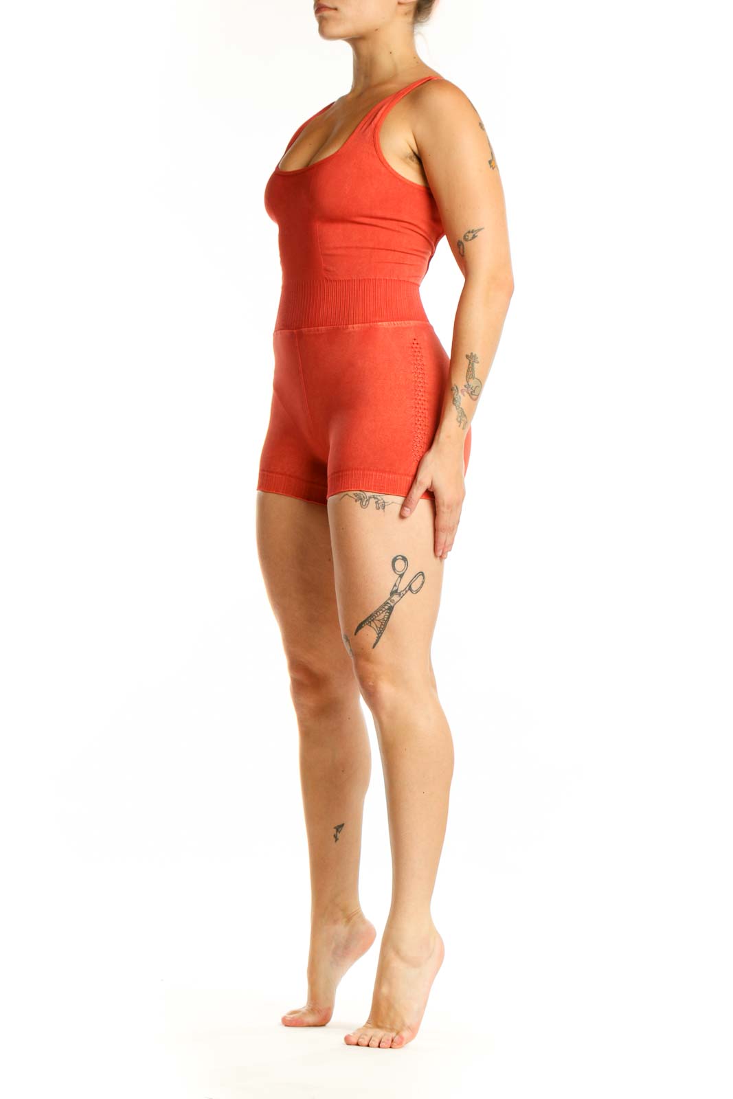 Red ribbed knit shorts romper with scoop neckline and fitted waistband, front view