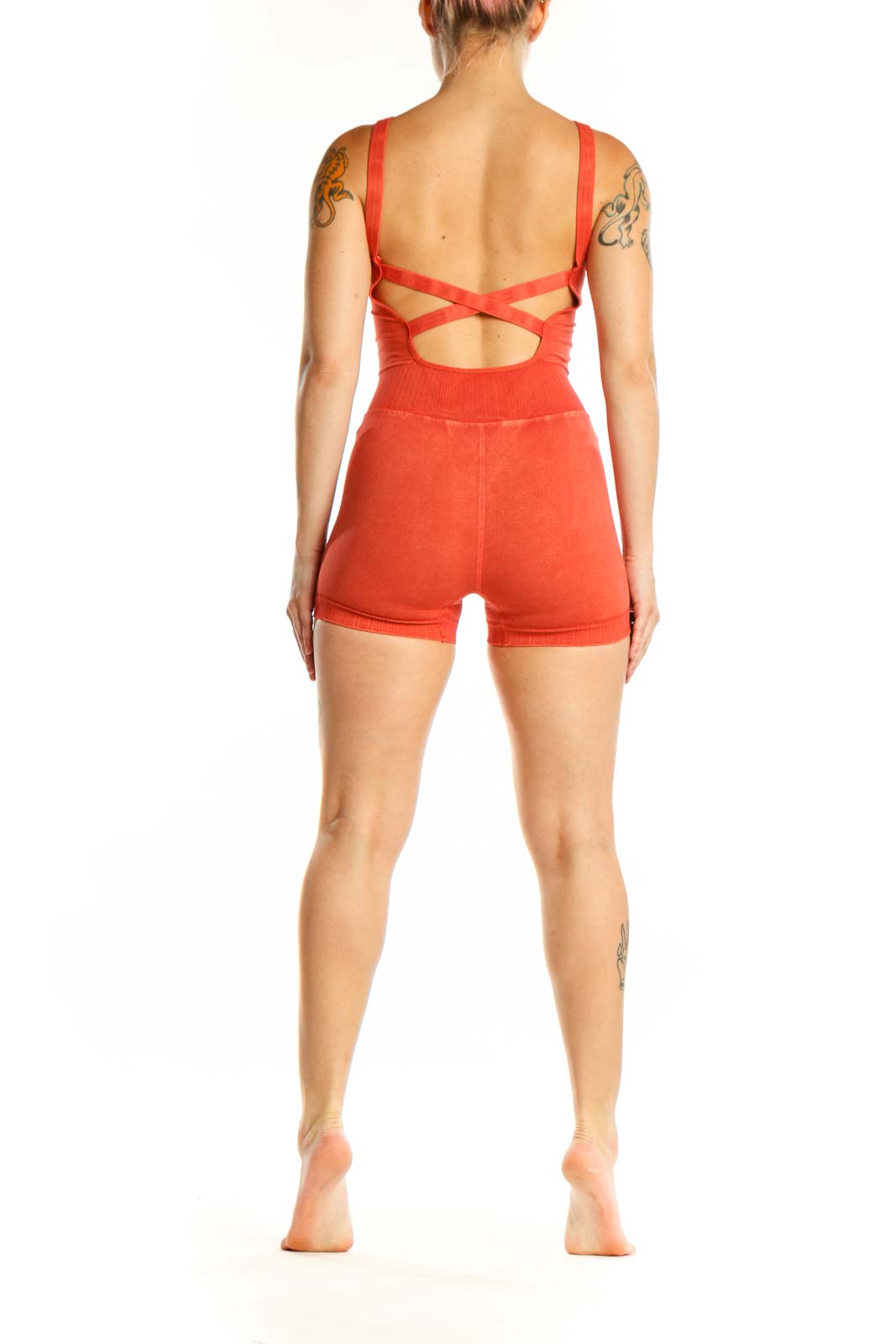 Red ribbed knit shorts romper with fitted back design and shorts length, back view