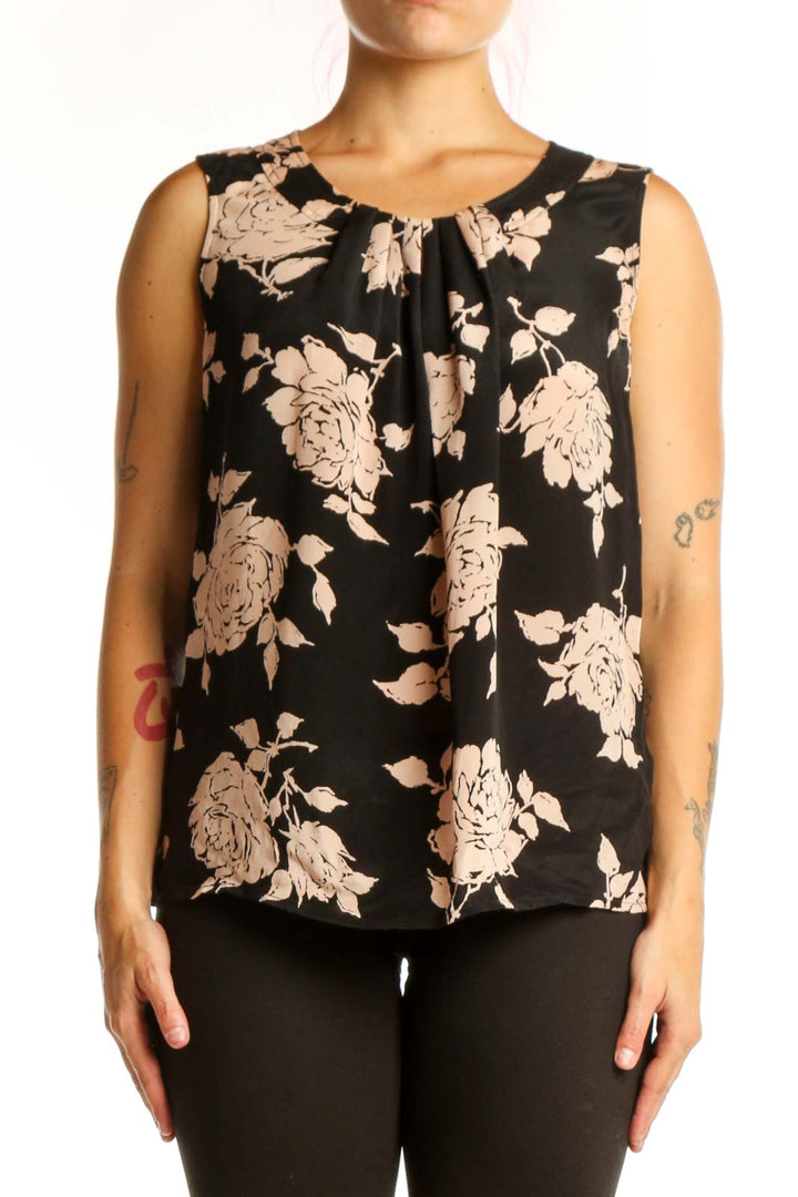 Black floral silk sleeveless top with cream and beige flower print and gathered neckline detail, front view