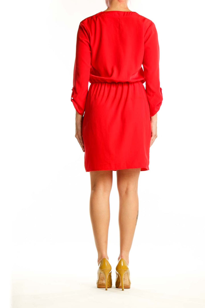 Red hooded polyester dress with drawstring waist and three-quarter sleeves, back view