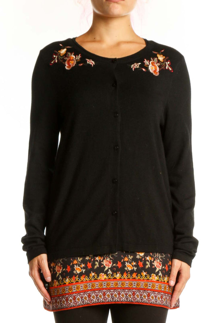 Black Desigual knit cardigan with orange and red floral embroidery on shoulders and hem, button-front closure, long sleeves