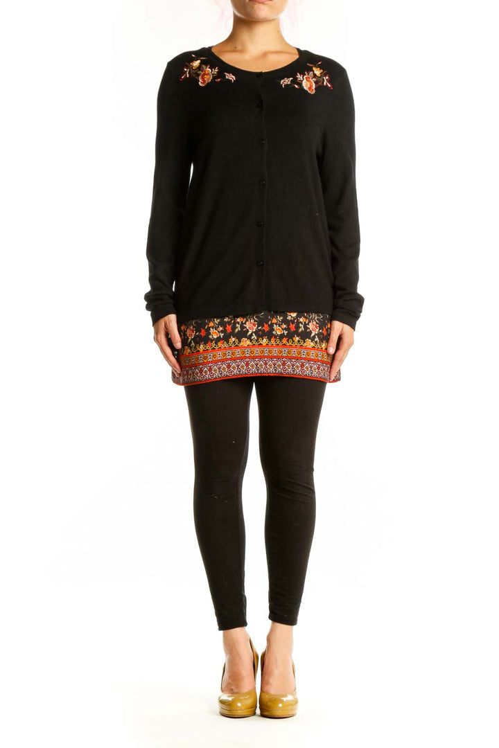 Black Desigual knit cardigan with orange and red floral embroidery on shoulders and hem, button-front closure, long sleeves