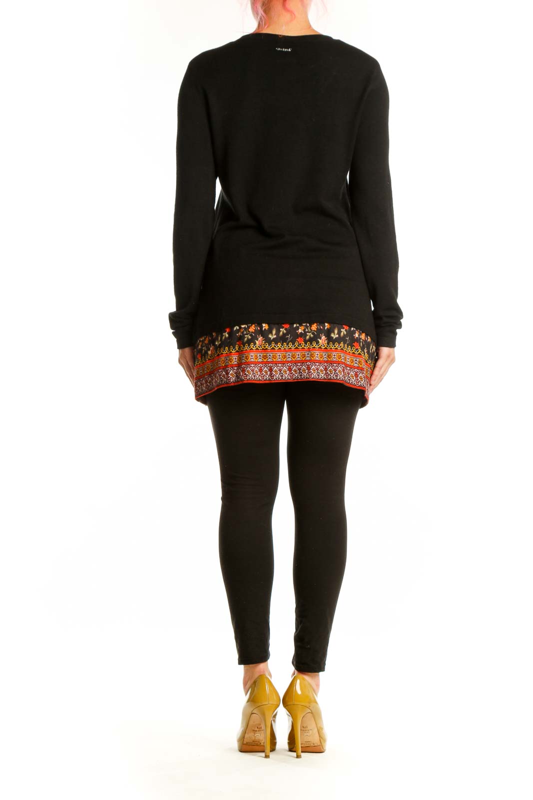 Back view of black Desigual cardigan showing floral embroidered hem and folk-inspired geometric border pattern