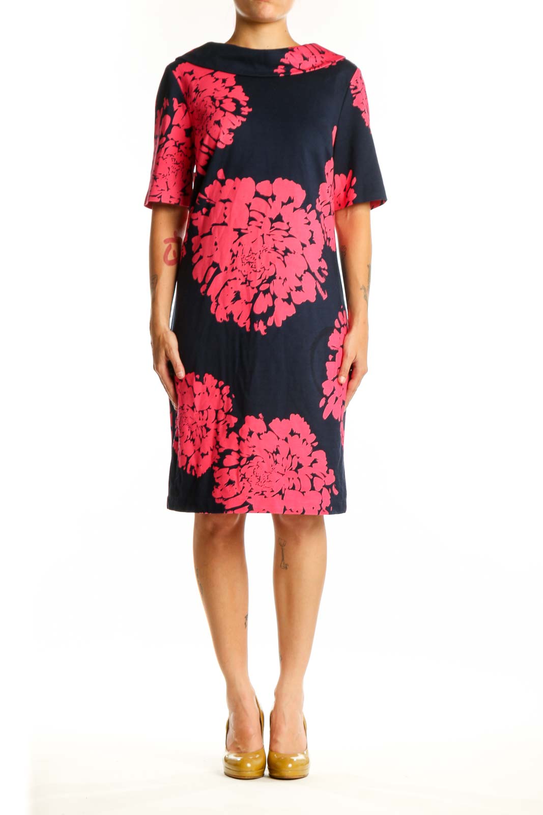 Black shift dress with vibrant pink floral print, short sleeves, crew neckline, front view