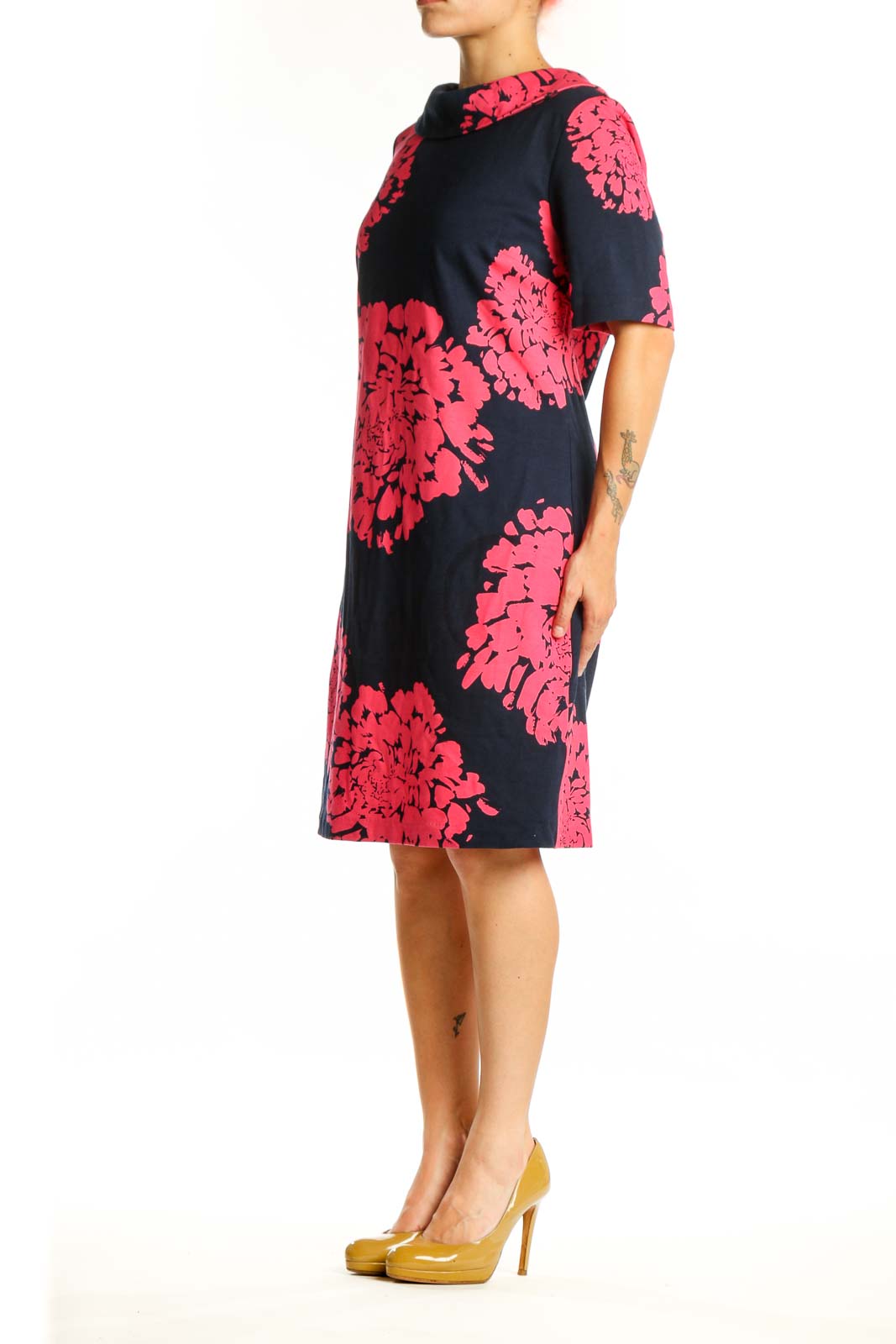 Black shift dress with vibrant pink floral print, short sleeves, crew neckline, front view