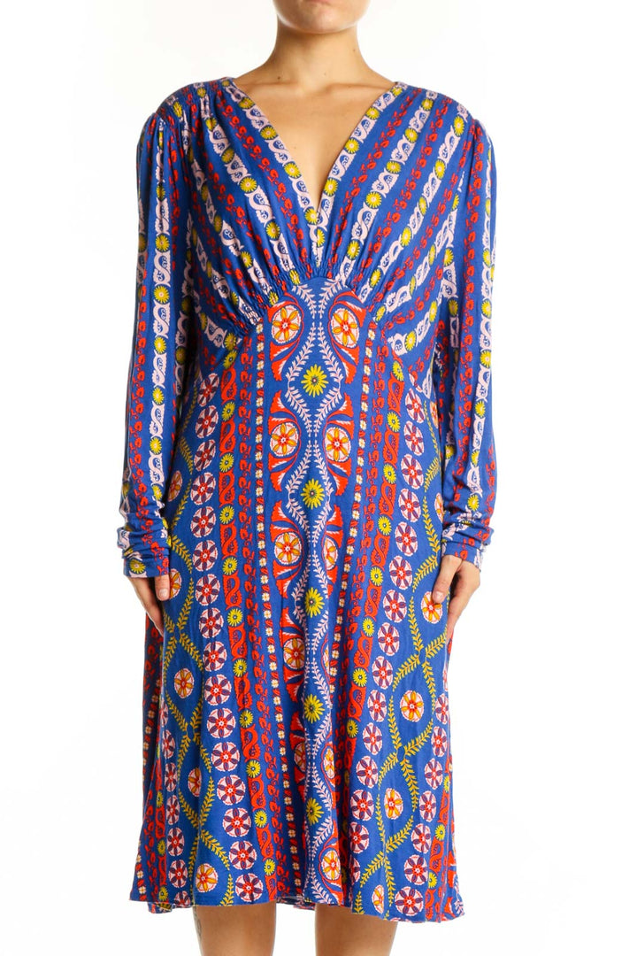 Front view of blue multicolor geometric print Boden midi dress with V-neckline and long sleeves