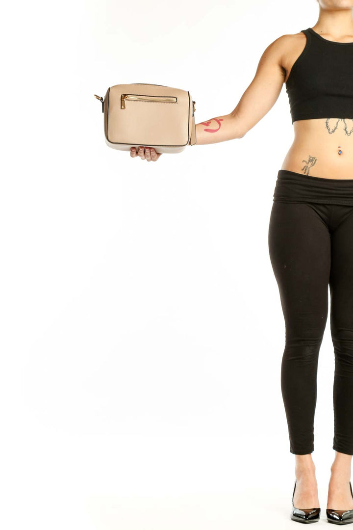 Cream structured crossbody clutch with gold-tone zip pocket and adjustable strap by SilkRoll