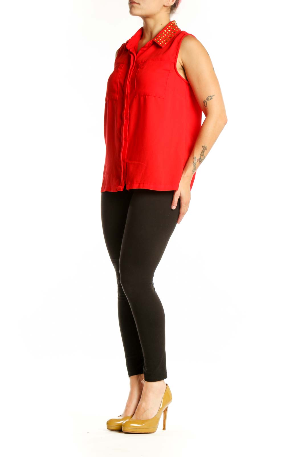 Red sleeveless button-up top with gold studded collar, front view on model