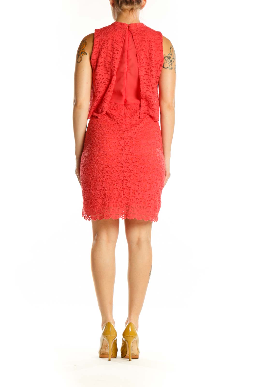 Red lace overlay cocktail dress with scalloped edges, back view showing layered design
