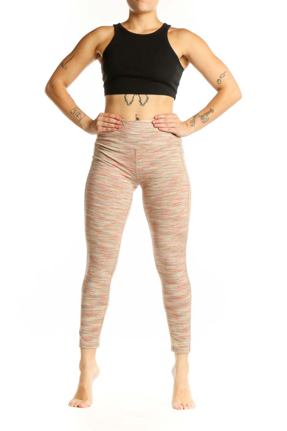 Front view of multicolor striped athletic leggings with horizontal coral, cream, and pastel stripes, high-waisted design, and cropped ankle length