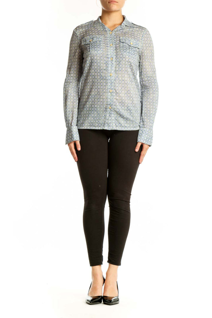 Tory Burch blue geometric cotton button-up shirt with collared neckline and chest pockets, front view on model