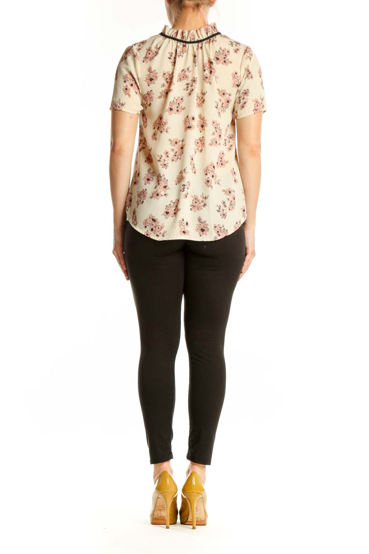 SilkRoll cream floral blouse with pink flowers, back view showing short sleeves and relaxed fit