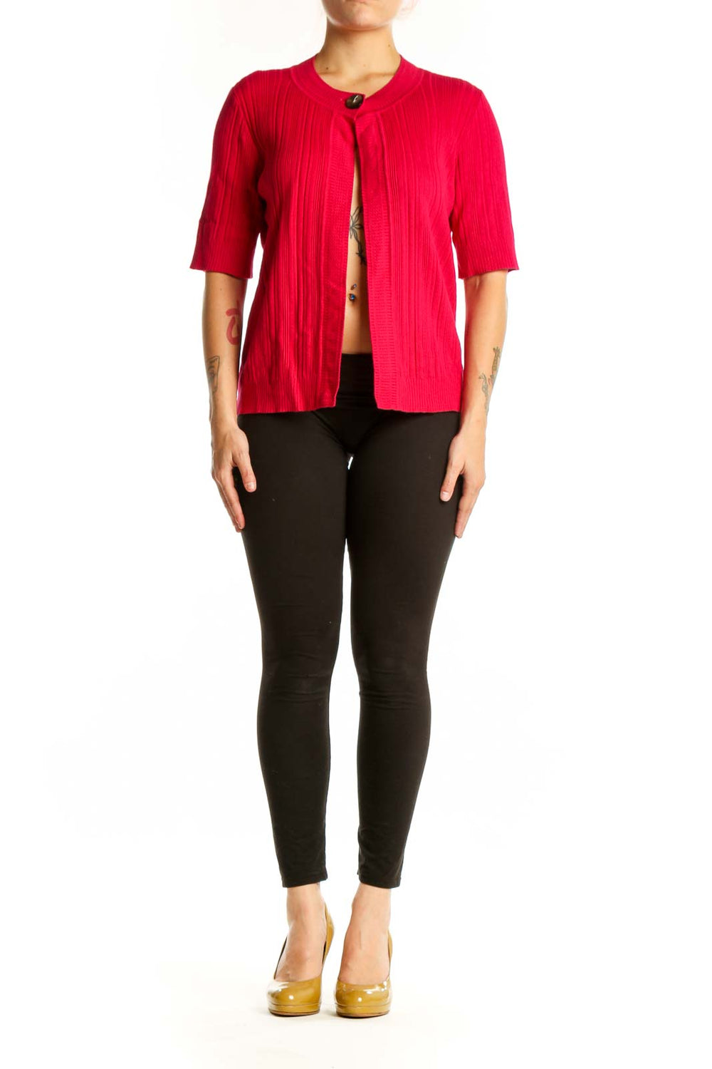 Red ribbed knit cardigan with button-front closure and three-quarter sleeves, worn open over black pants