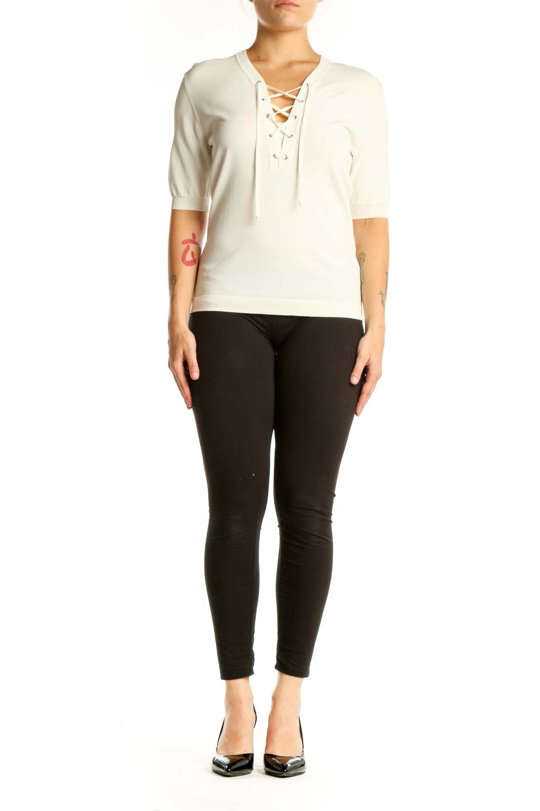 Cream lace-up V-neck top with three-quarter sleeves, front view on model