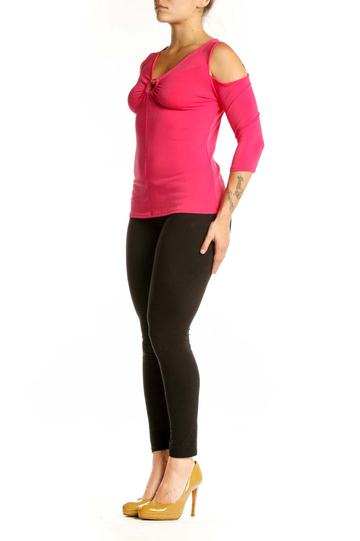 Pink cold shoulder top with keyhole cutout and three-quarter sleeves, front view