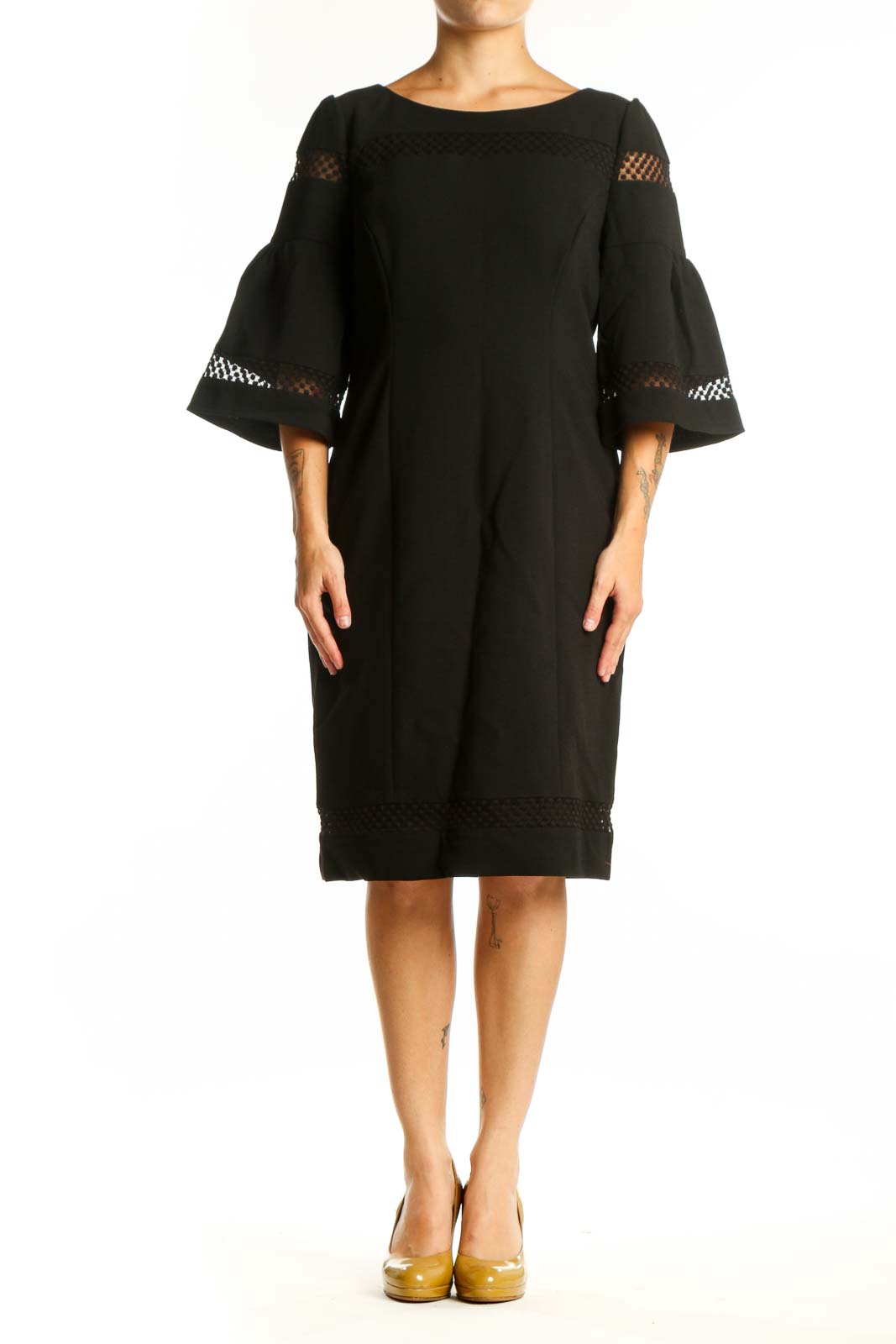 Black bell sleeve lace dress with mesh cutouts, front view on model