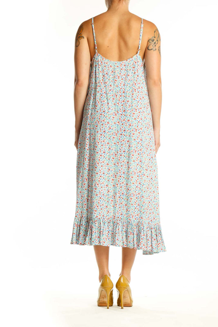 Multicolor floral print midi dress with asymmetrical handkerchief hem, back view