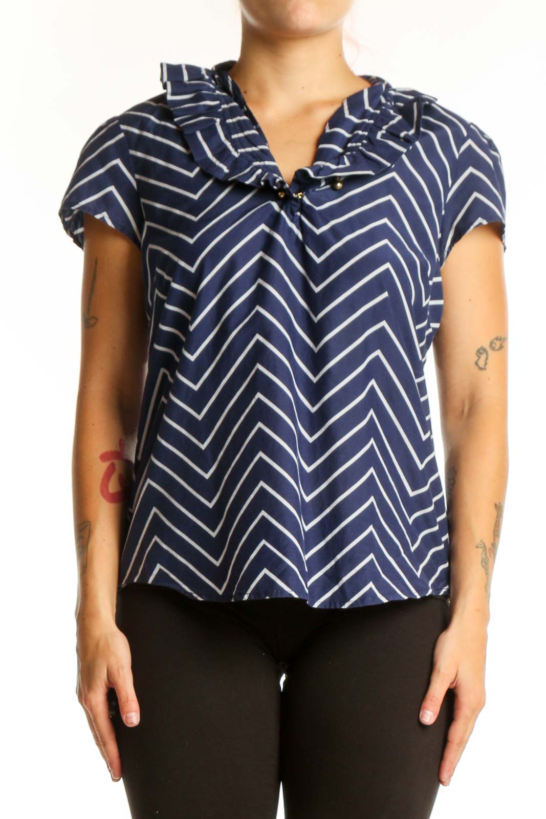 Navy and white chevron striped short sleeve top with V-neckline and tie detail, front view