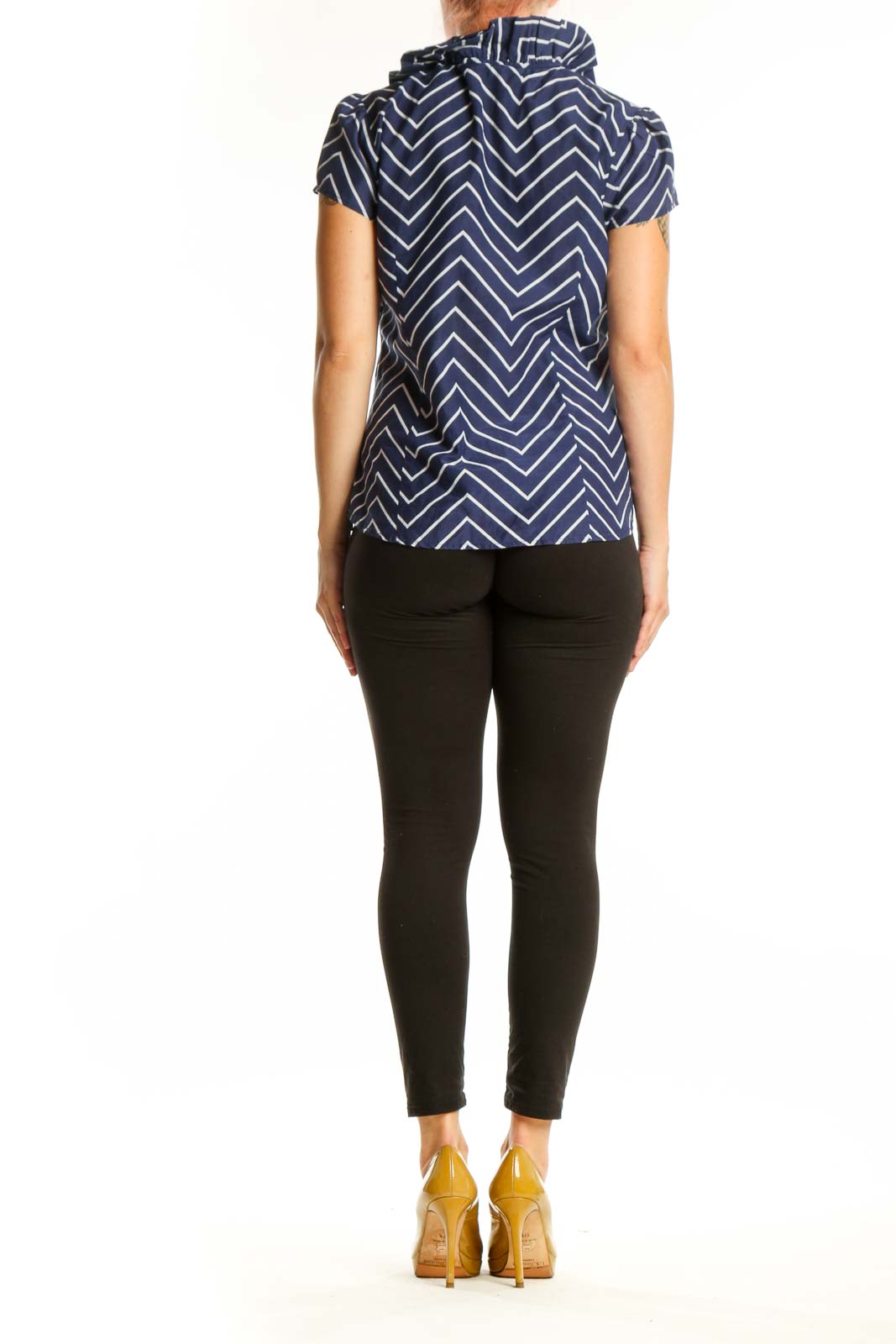 Navy and white chevron striped short sleeve top with puffed sleeves, back view