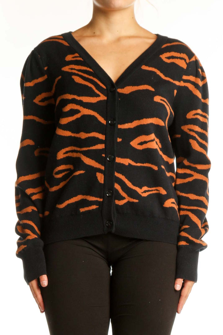 Black and orange tiger stripe cardigan by Amour Vert with button-front closure and V-neckline, front view