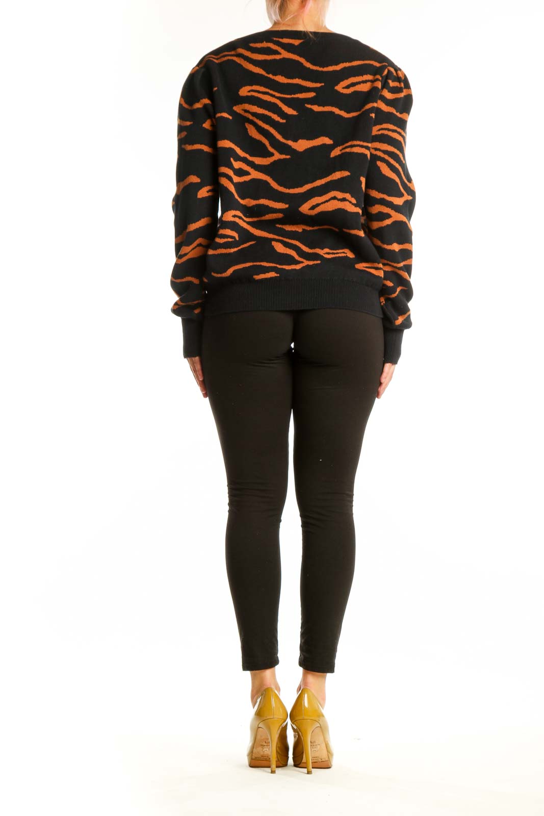 Black and orange tiger stripe cardigan by Amour Vert, back view showing full length and pattern
