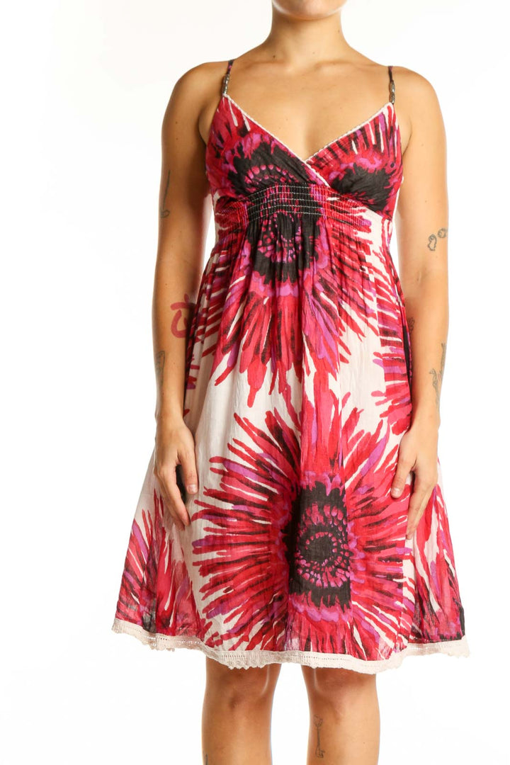 Red floral empire waist midi dress with sunflower botanical print, sweetheart neckline and spaghetti straps