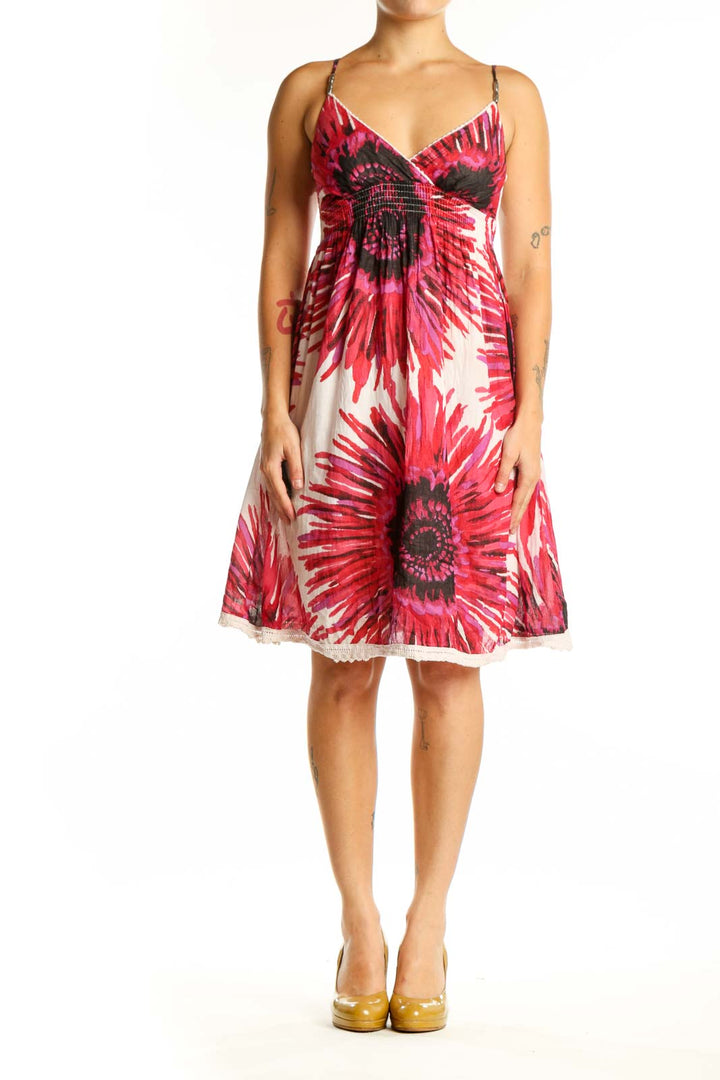 Red floral empire waist midi dress with sunflower botanical print, sweetheart neckline and spaghetti straps