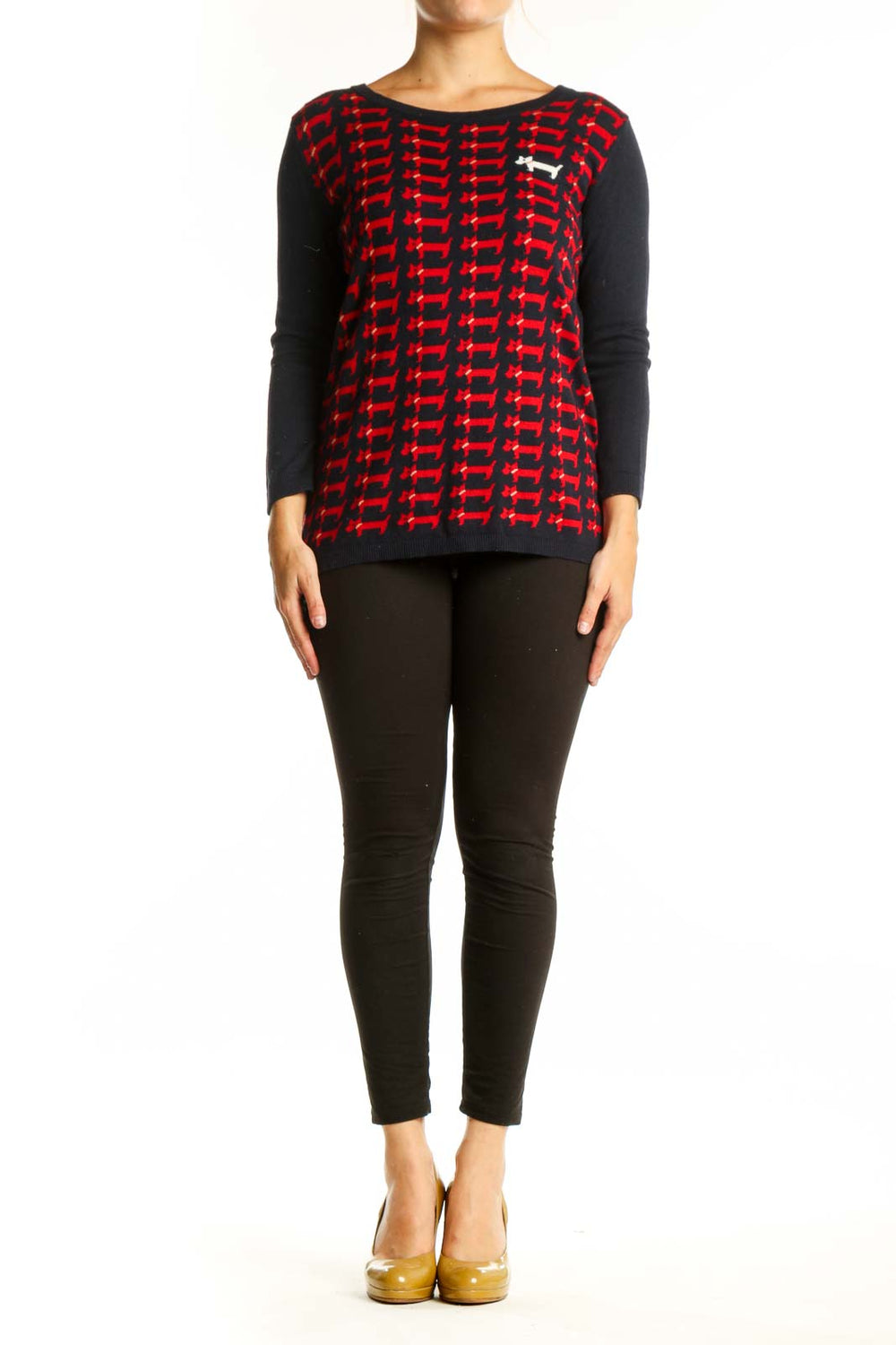 Red dachshund print knit pullover with black long sleeves, front view on model