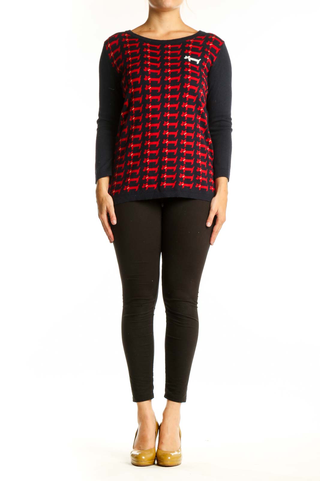 Red dachshund print knit pullover with black long sleeves, front view on model