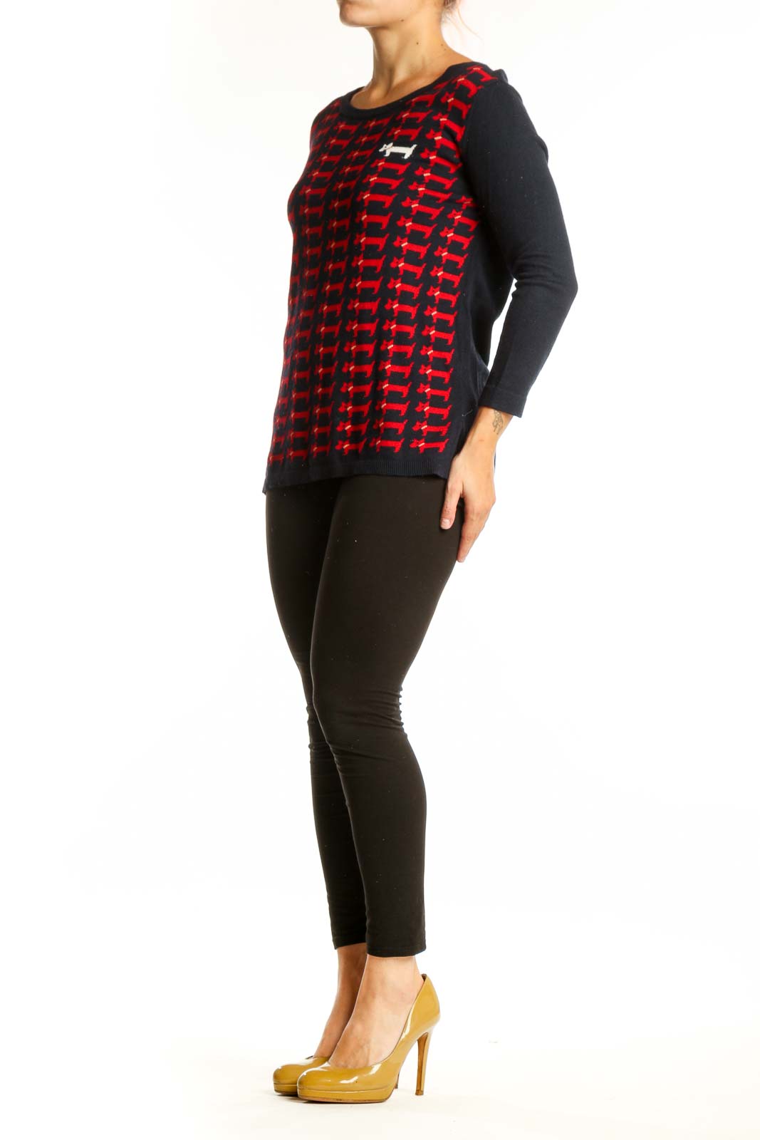 Red dachshund print knit pullover with black long sleeves, front view on model