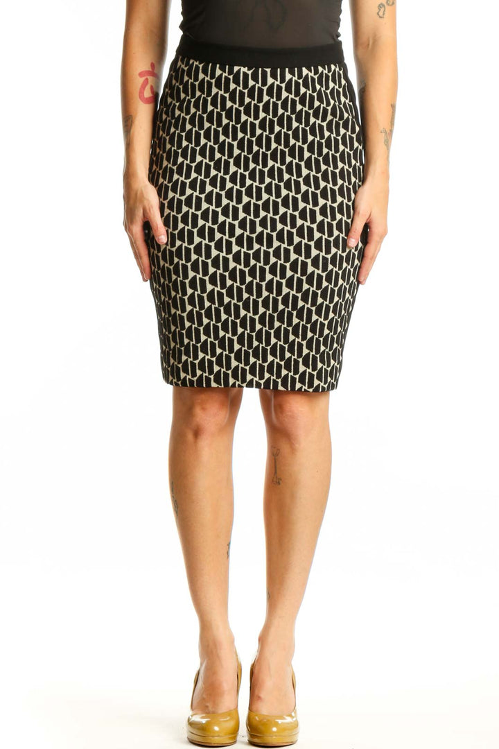 Black and cream geometric pencil skirt by Diane von Furstenberg, front view on model